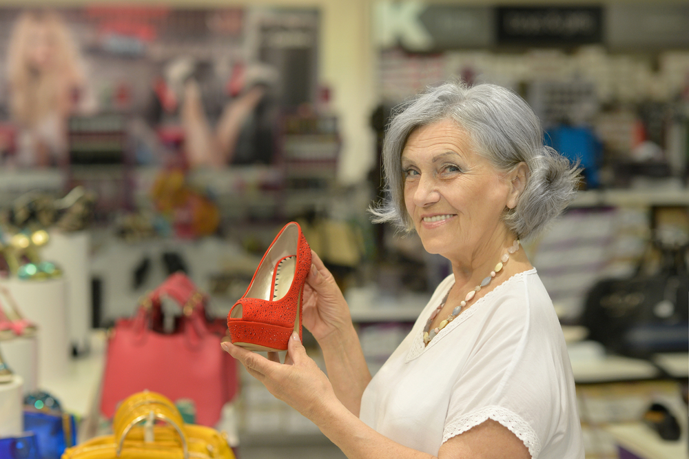 Senior woman choosing her favorite shoes